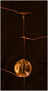 Honey spoons and a glass ball